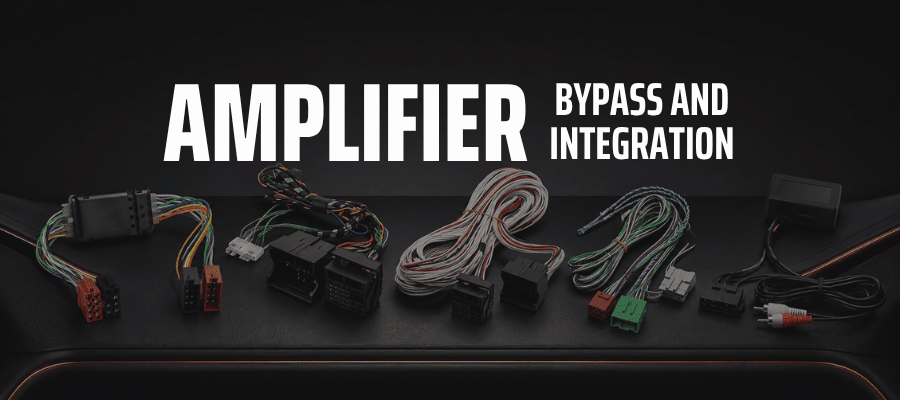 Vehicle-specific factory car amplifier integration interfaces and bypass cables for aftermarket stereo installation